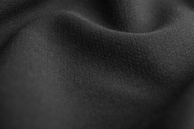 Photo of Texture of beautiful dark fabric as background, closeup