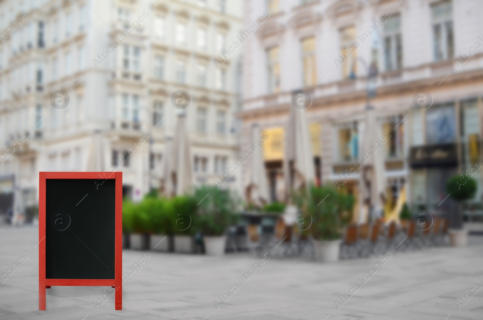 Image of Blank advertising board on city street. Space for text