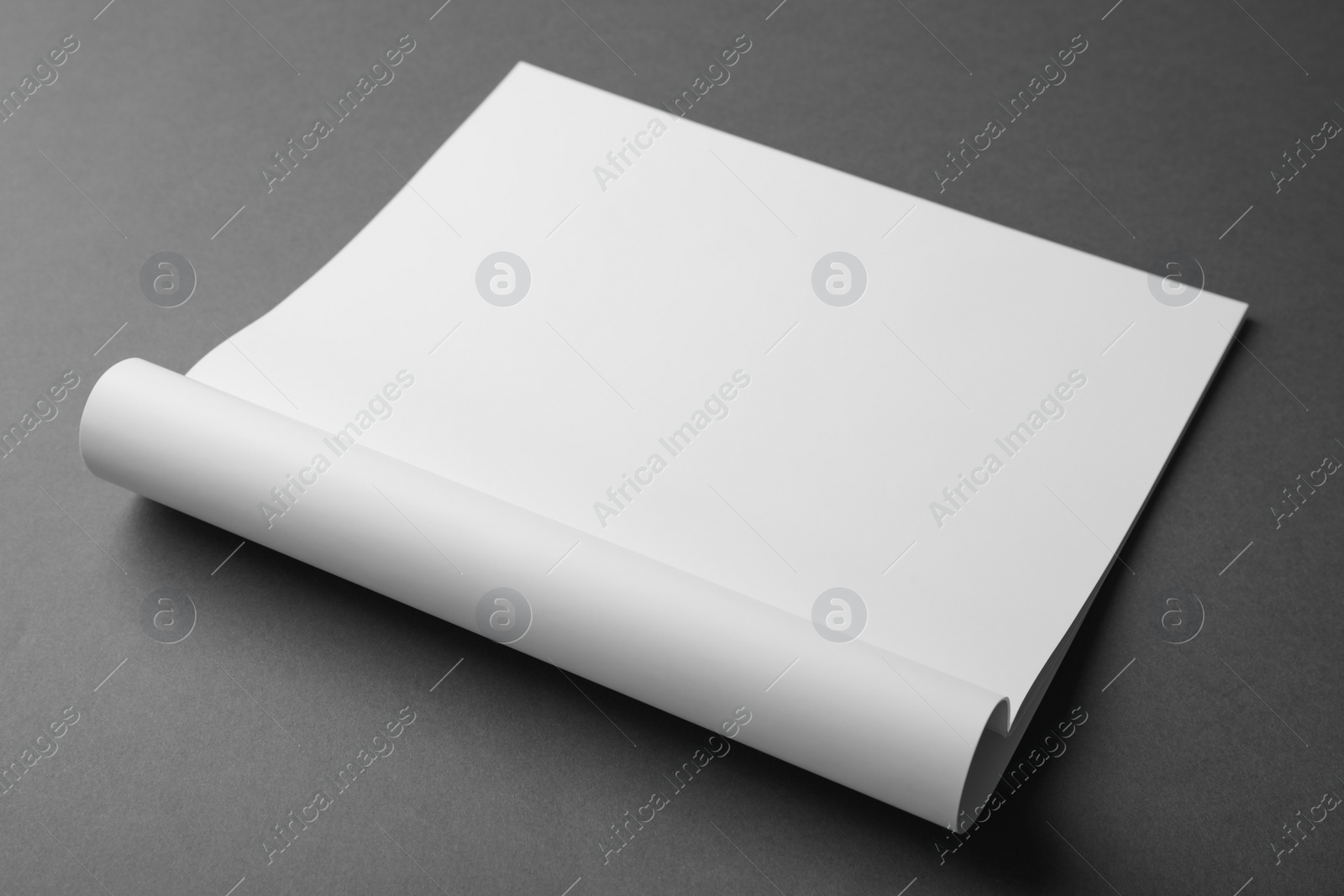 Photo of Blank book on dark grey background. Mock up for design