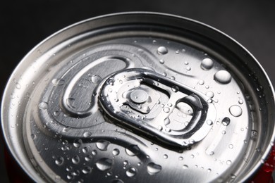 Energy drink in wet can, closeup. Functional beverage