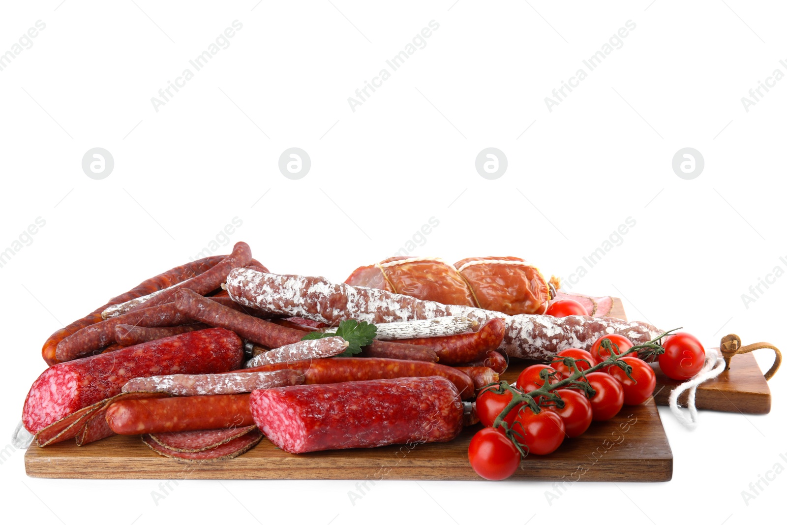 Photo of Wooden board with different tasty sausages isolated on white