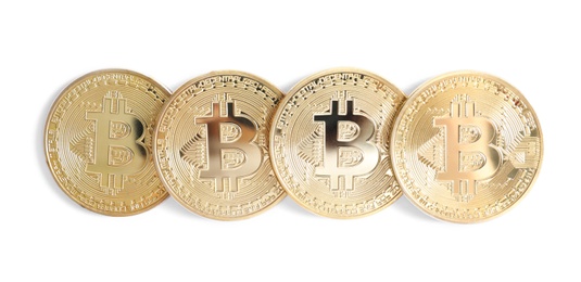 Row of bitcoins isolated on white, top view. Digital currency