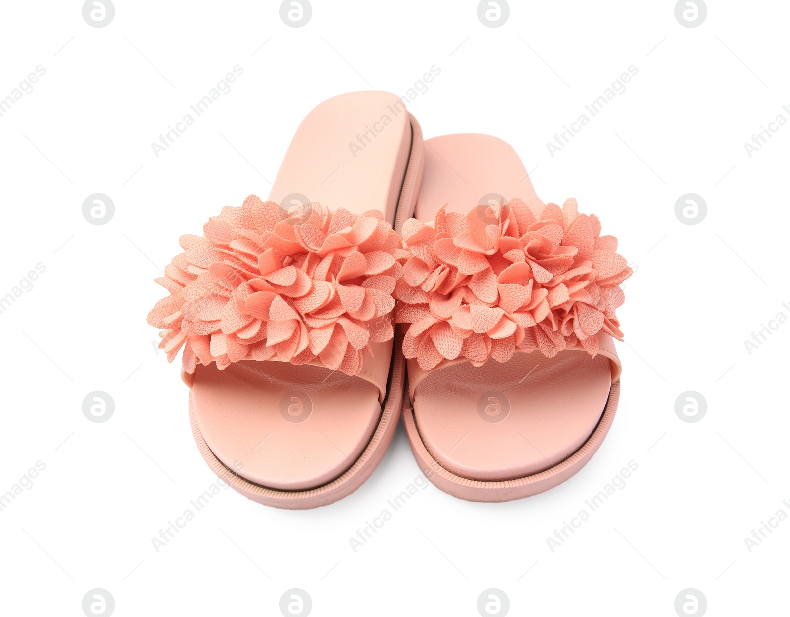 Photo of Pair of stylish coral slippers isolated on white