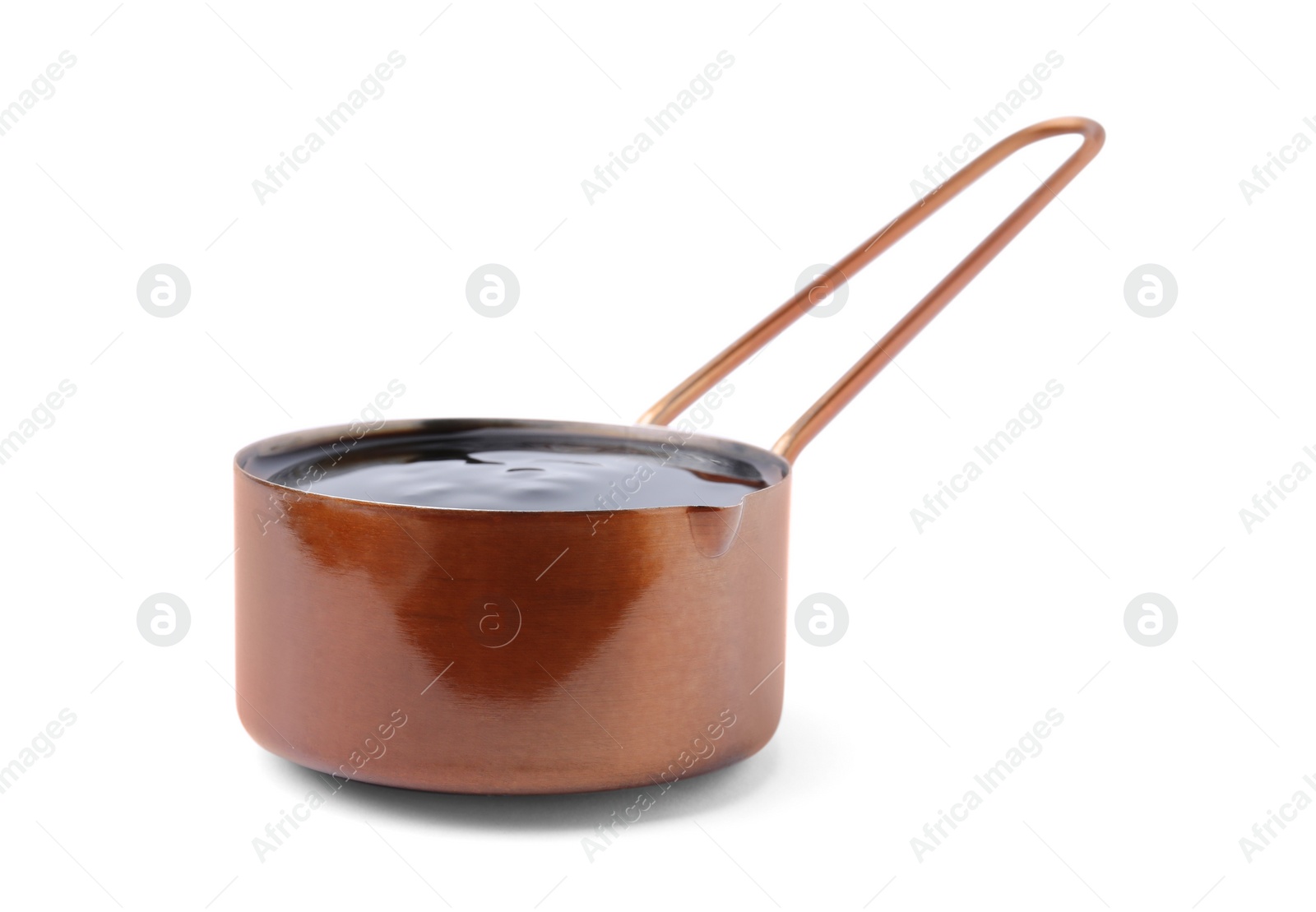 Photo of Metal small saucepan with balsamic glaze on white background