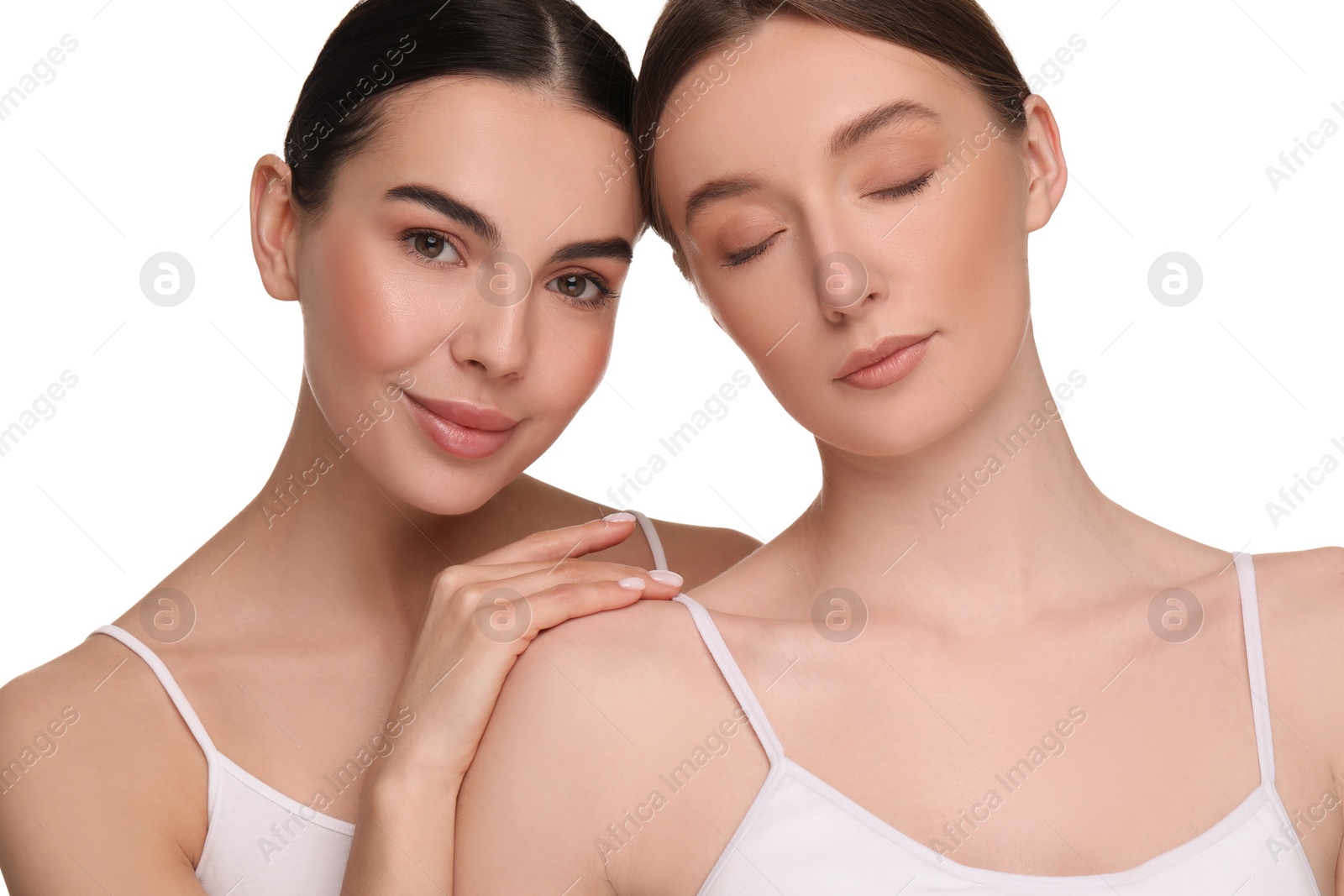 Photo of Beautiful young women with healthy skin on white background
