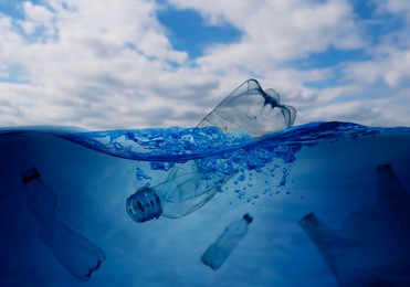 Image of Different plastic garbage in ocean. Environmental pollution