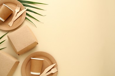 Photo of Flat lay composition with eco friendly products on beige background, space for text