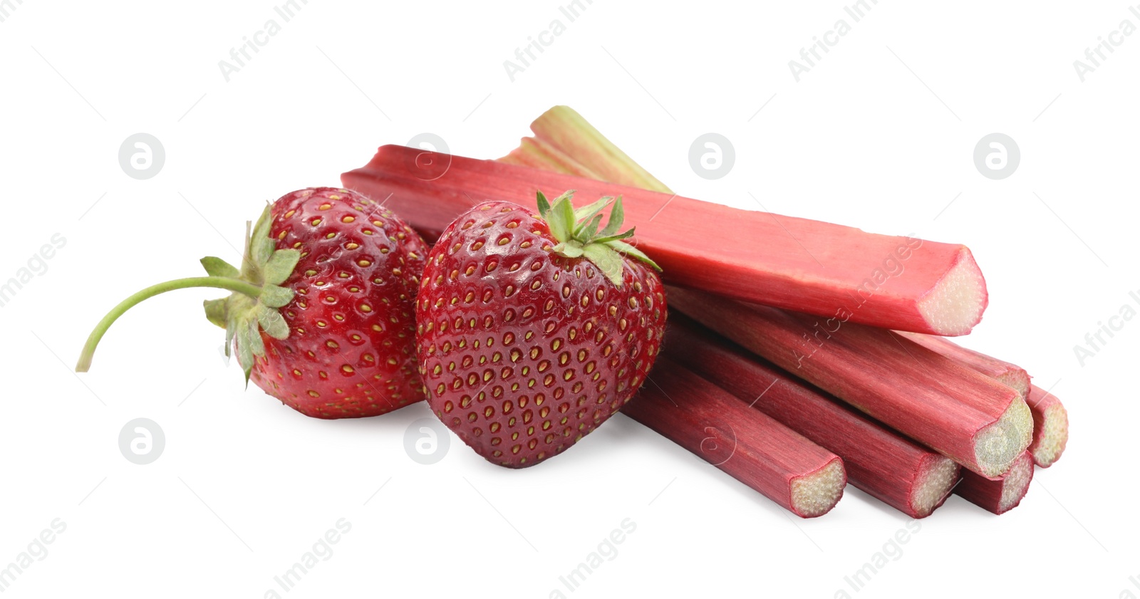 Photo of Stalks of fresh rhubarb and strawberries isolated on white