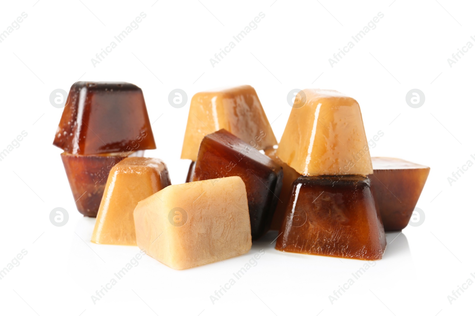 Photo of Ice cubes made with coffee on white background