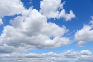 Photo of Picturesque view of beautiful fluffy clouds in light blue sky