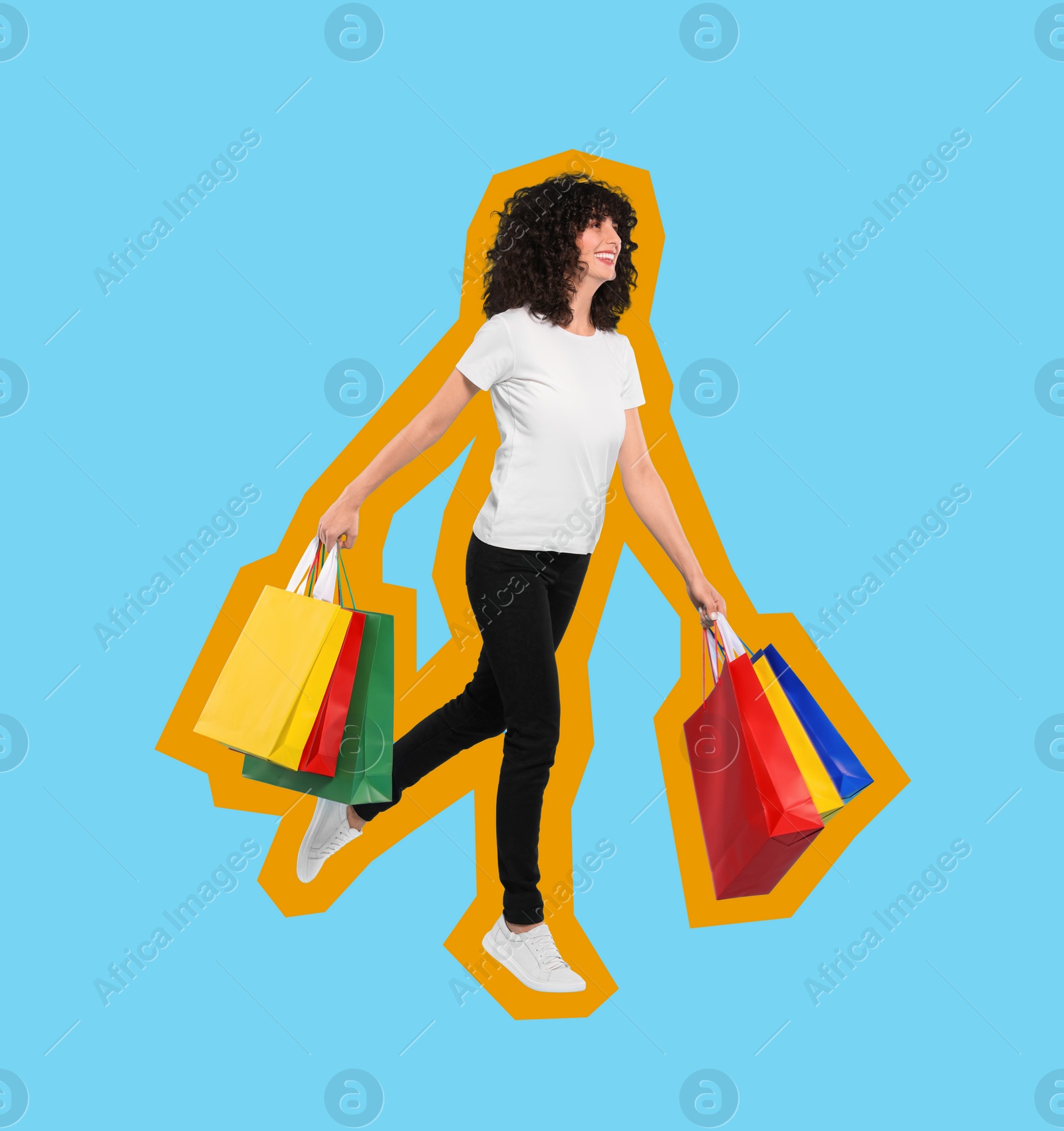 Image of Happy woman with shopping bags on light blue background