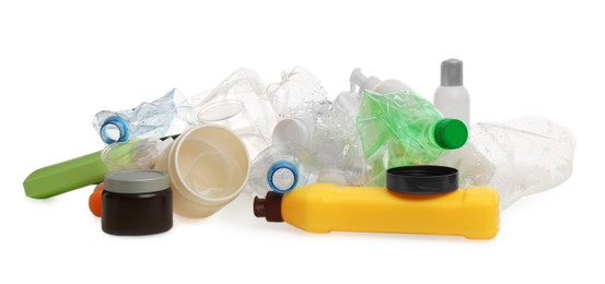 Pile of plastic garbage on white background