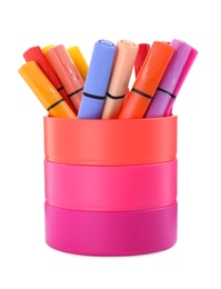 Photo of Many colorful markers in holder on white background