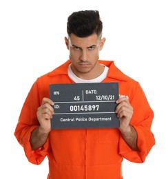 Photo of Mug shot of prisoner in orange jumpsuit with board on white background, front view
