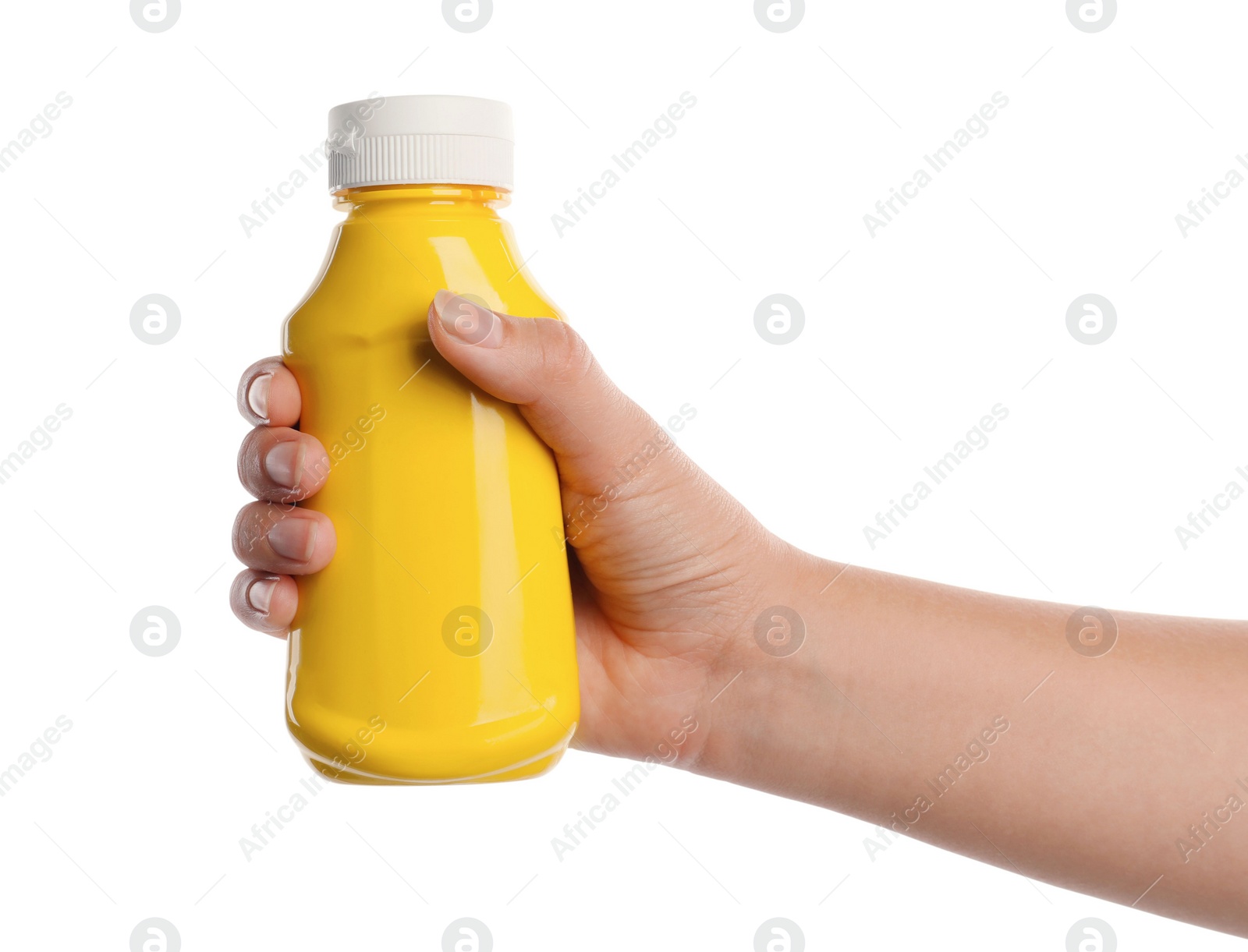 Photo of Woman with bottle of mustard on white background, closeup