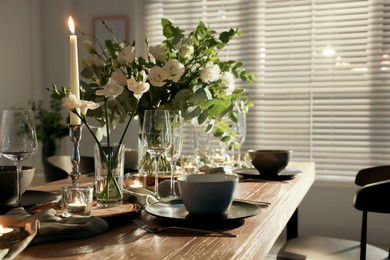 Festive table setting with beautiful tableware and decor indoors