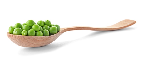 Photo of Spoon with green peas on white background