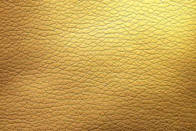 Image of Golden textured surface as background, closeup view