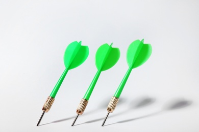 Green dart arrows for game on white background