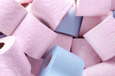 Photo of Many rolls of toilet paper as background. Personal hygiene