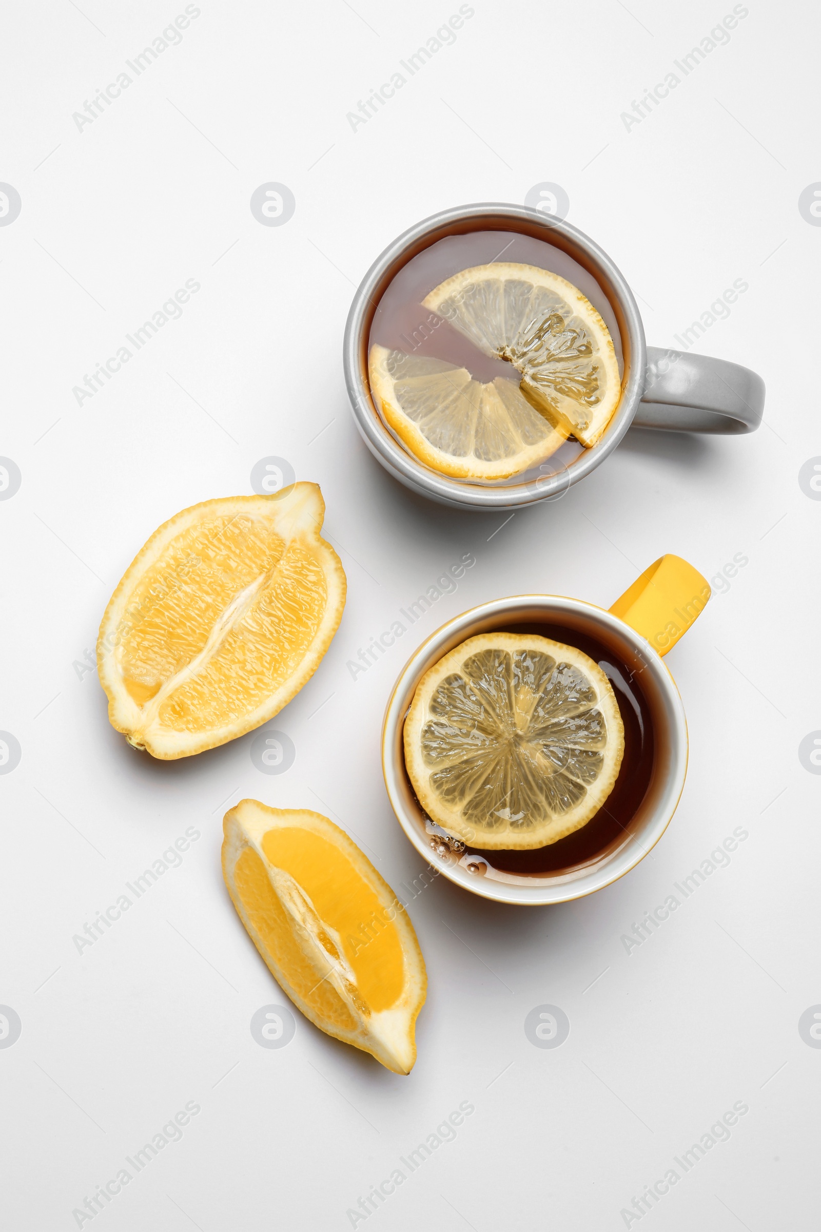 Photo of Composition with lemon tea on white background, top view