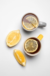 Photo of Composition with lemon tea on white background, top view