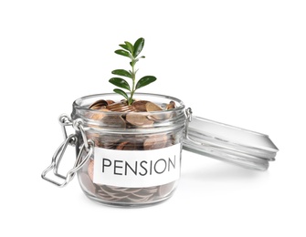 Glass jar with label PENSION, coins and green plant isolated on white