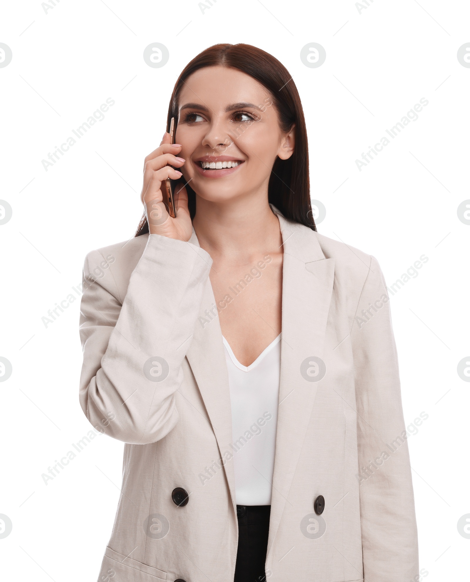 Photo of Beautiful businesswoman in suit talking on smartphone against white background