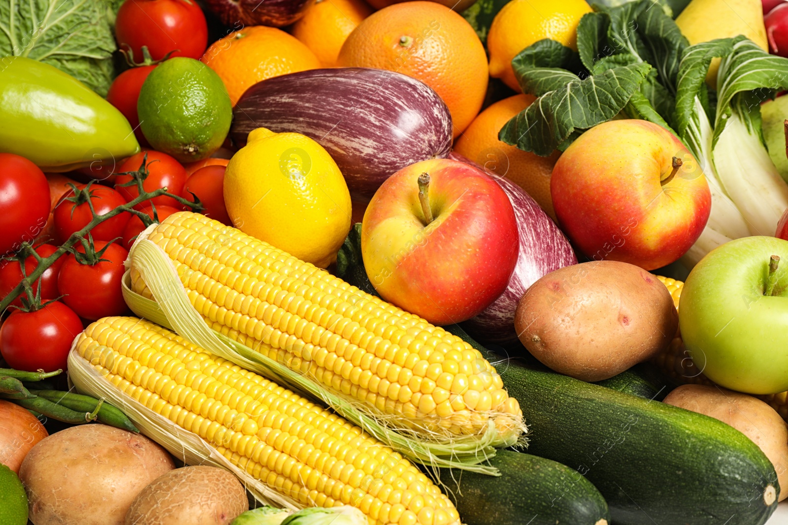 Photo of Assortment of fresh organic fruits and vegetables as background, closeup