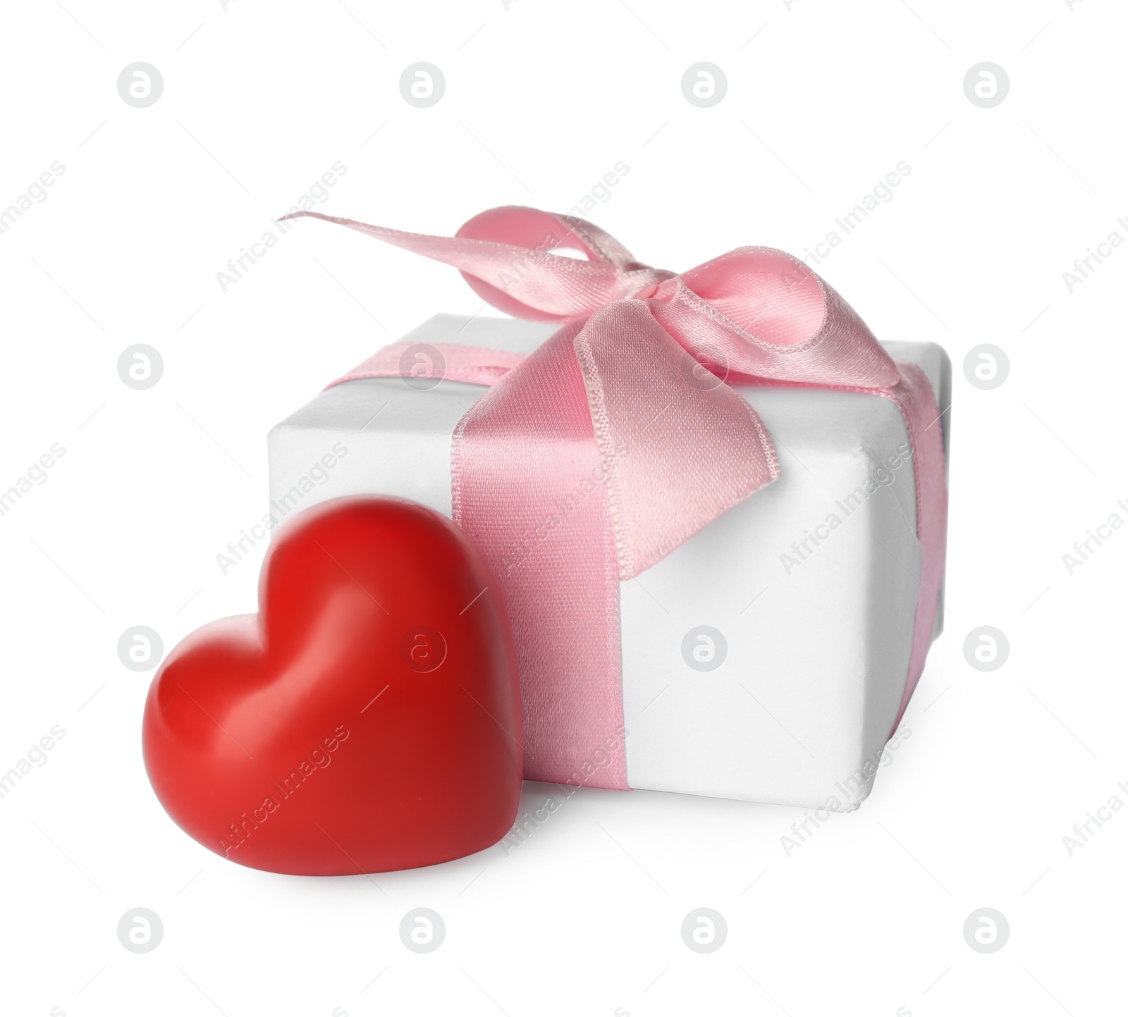 Photo of Beautiful gift box and red heart on white background. Valentine's day celebration