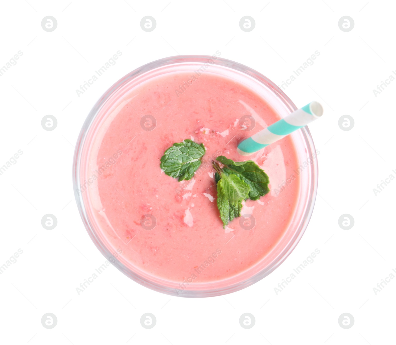 Photo of Tasty strawberry smoothie with mint in glass isolated on white, top view