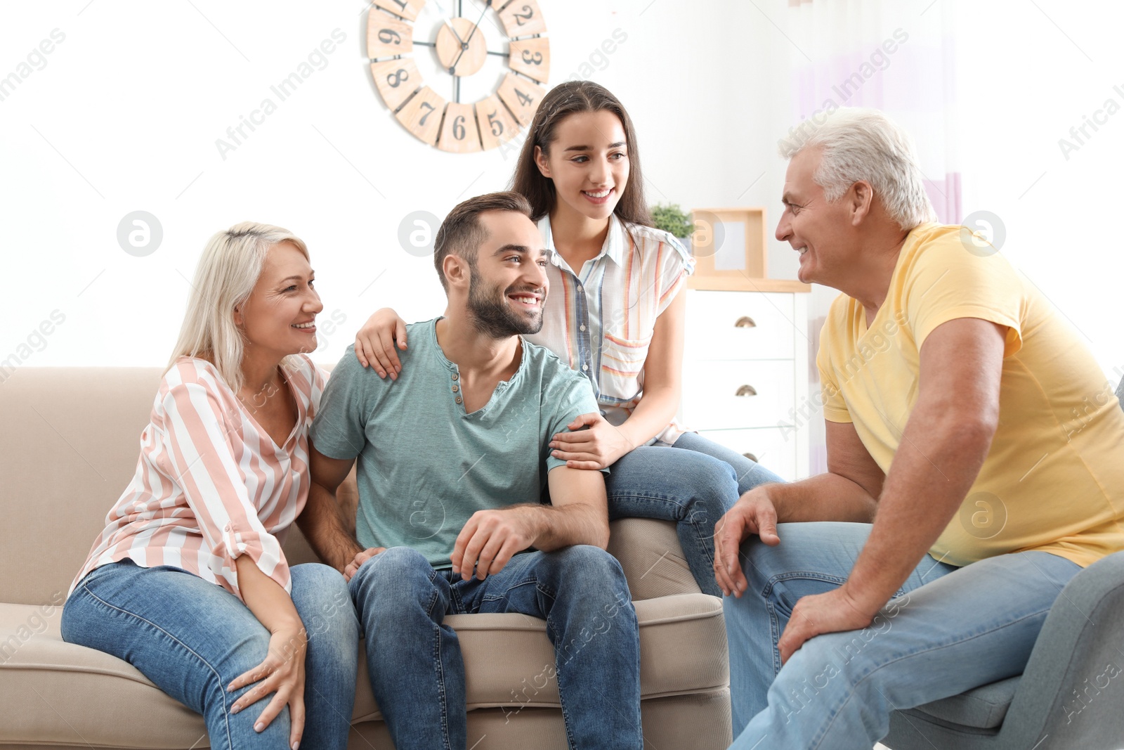 Photo of Happy family at home. Reunion of generations