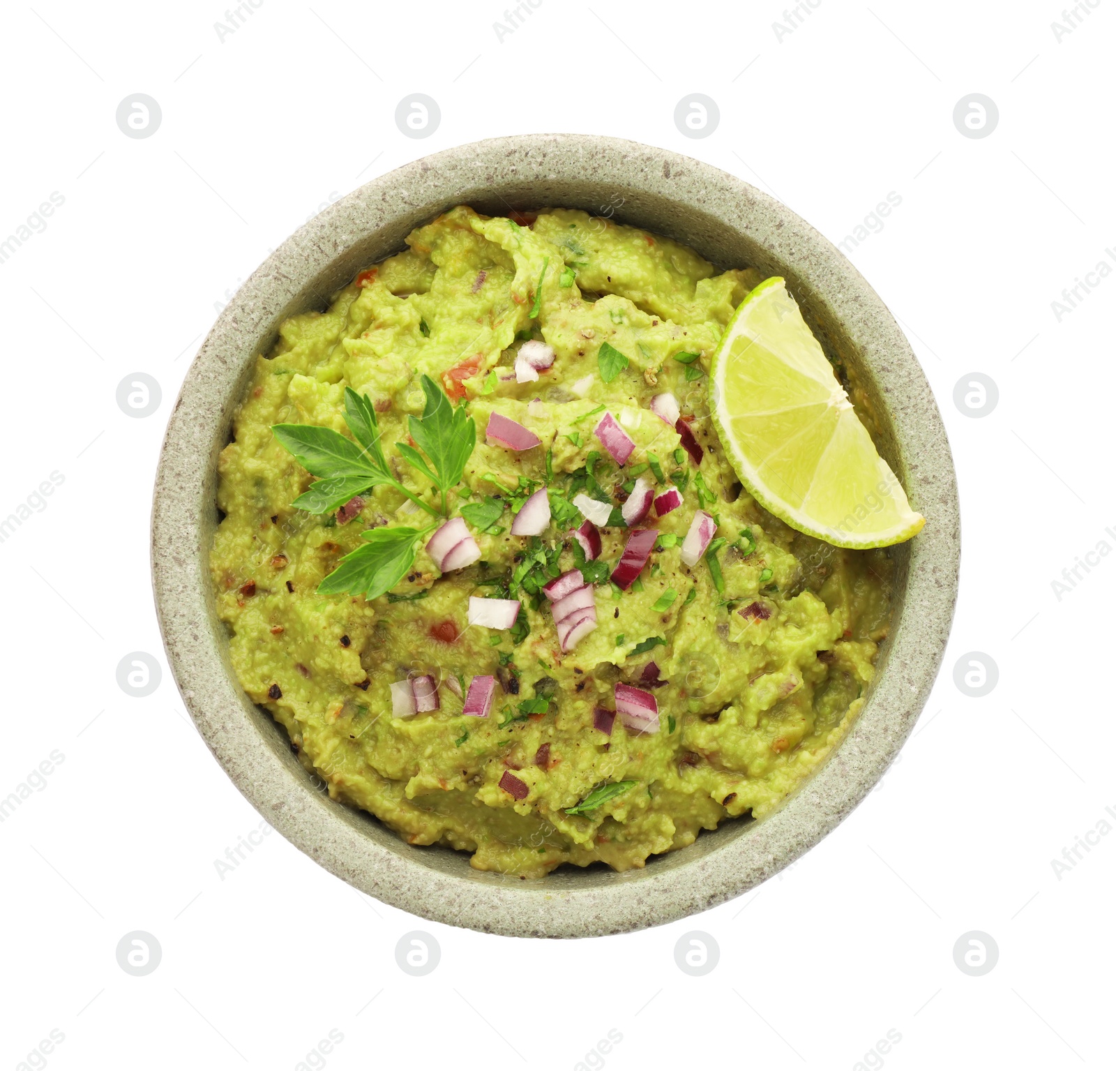 Photo of Bowl of delicious guacamole with lime isolated on white, top view