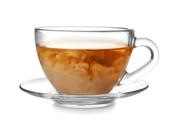 Glass cup with black tea and milk on white background