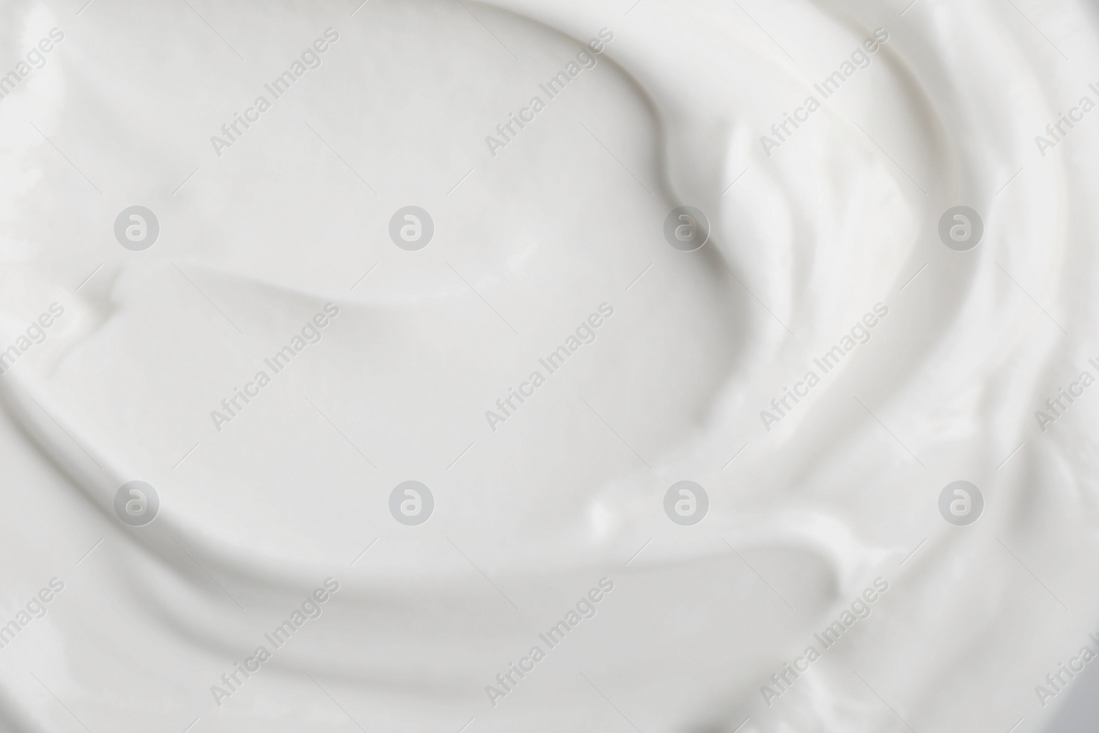 Photo of Delicious natural yogurt as background, top view