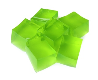 Photo of Heap of green jelly cubes on white background