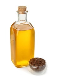 Photo of Vegetable fats. Flax oil in glass bottle and seeds isolated on white