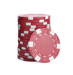 Photo of Red casino chips stacked on white background. Poker game