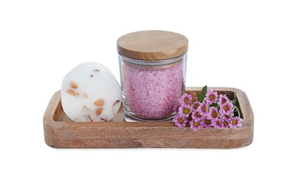 Glass container of pink sea salt, natural soap and beautiful chrysanthemum flowers isolated on white