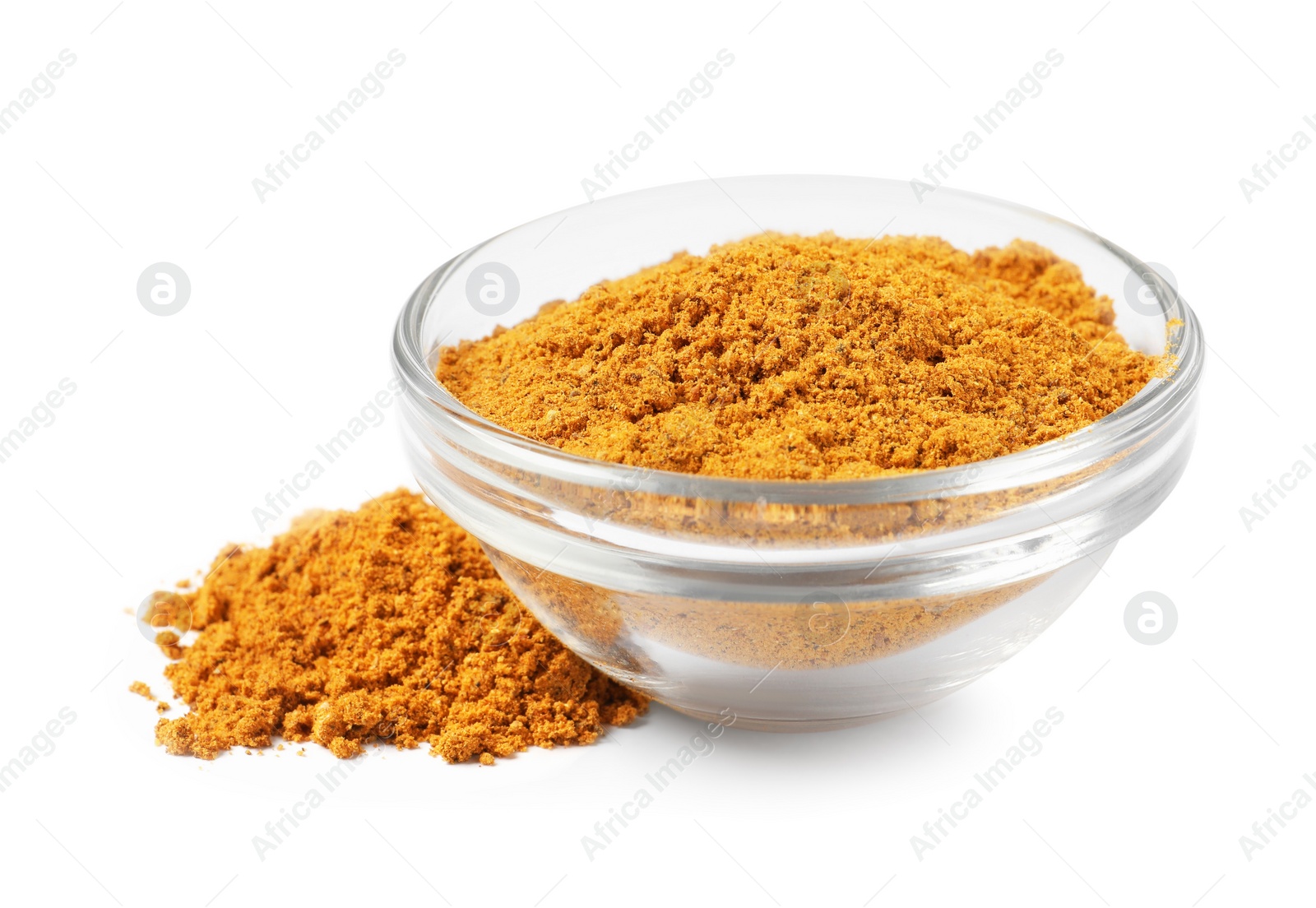 Photo of Curry powder in bowl isolated on white