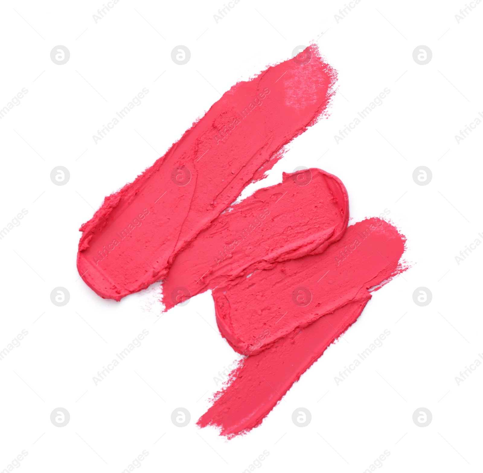 Photo of Smears of bright pink lipstick on white background