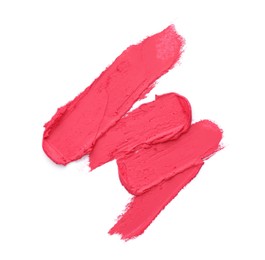 Photo of Smears of bright pink lipstick on white background