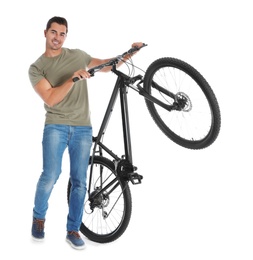 Photo of Handsome young man with modern bicycle on white background