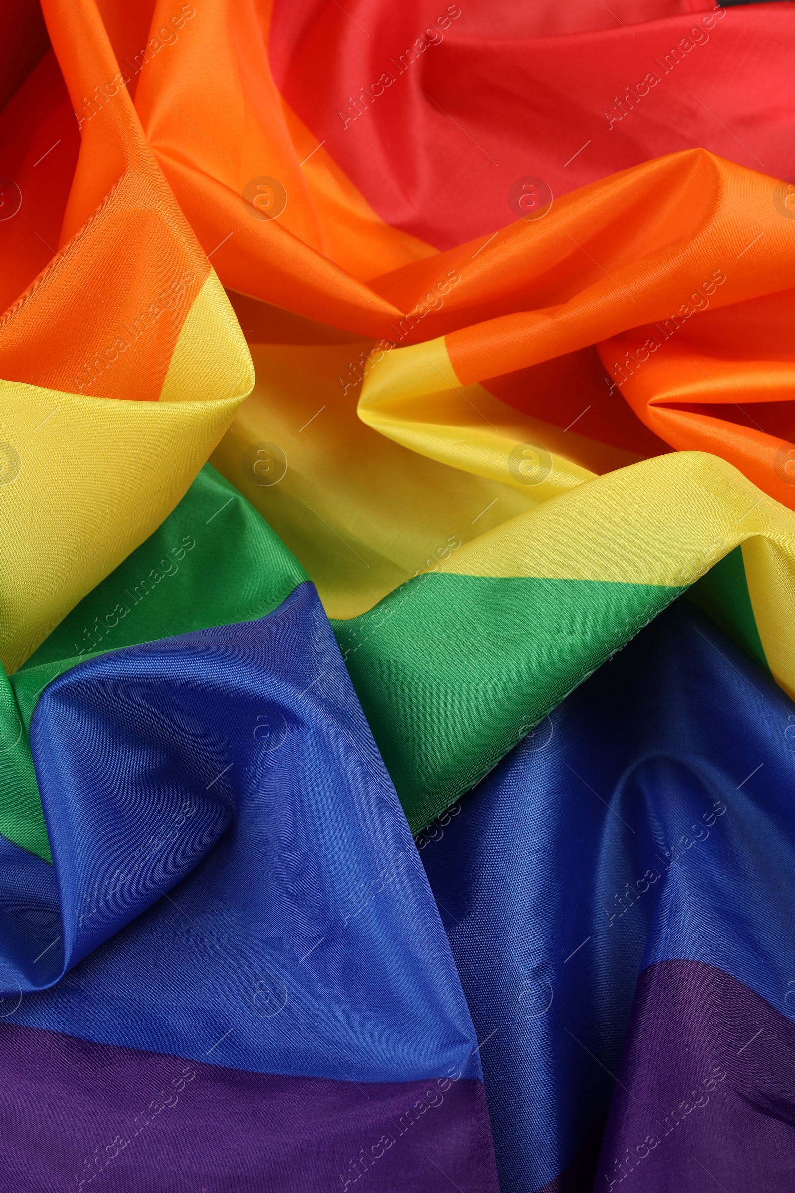 Photo of Rainbow LGBT flag as background, closeup view