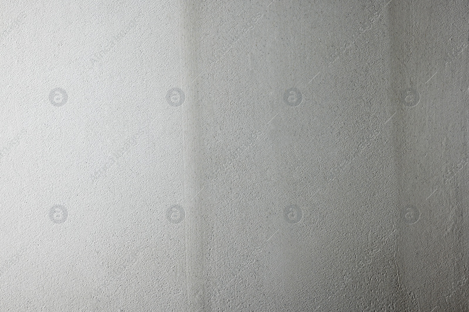 Photo of Wall covered with plaster as background, closeup