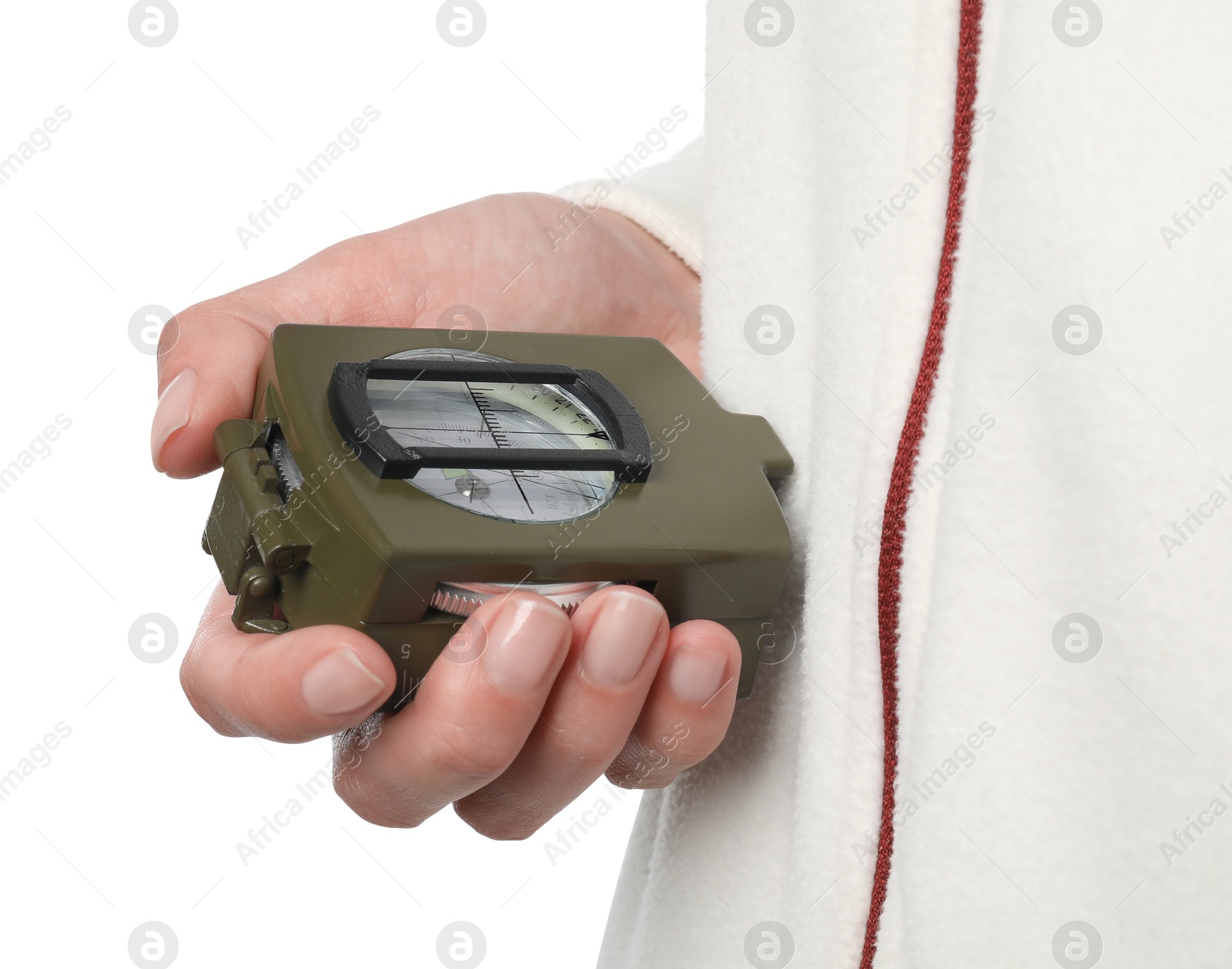 Photo of Woman holding compass on white background, closeup