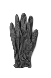 Photo of Medical glove on white background, top view