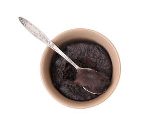 Photo of Tasty chocolate mug pie and spoon isolated on white, top view. Microwave cake recipe