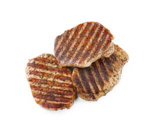 Photo of Delicious grilled pork steaks on white background, top view