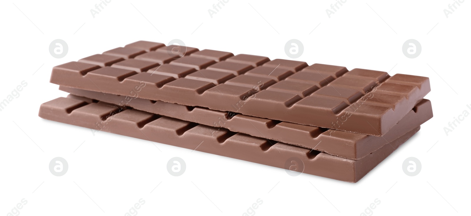 Photo of Delicious milk chocolate bars isolated on white